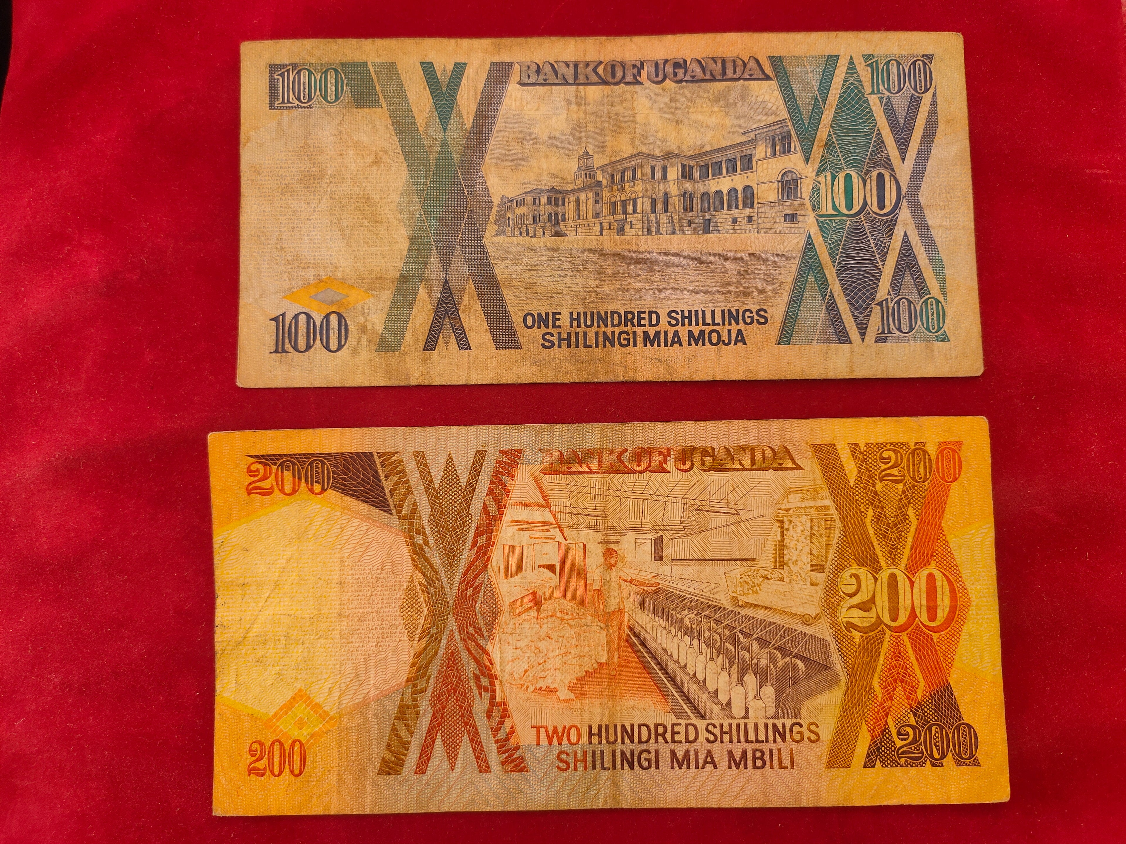 BANK OF UGANDA 100, 200 SHILINGI (255)