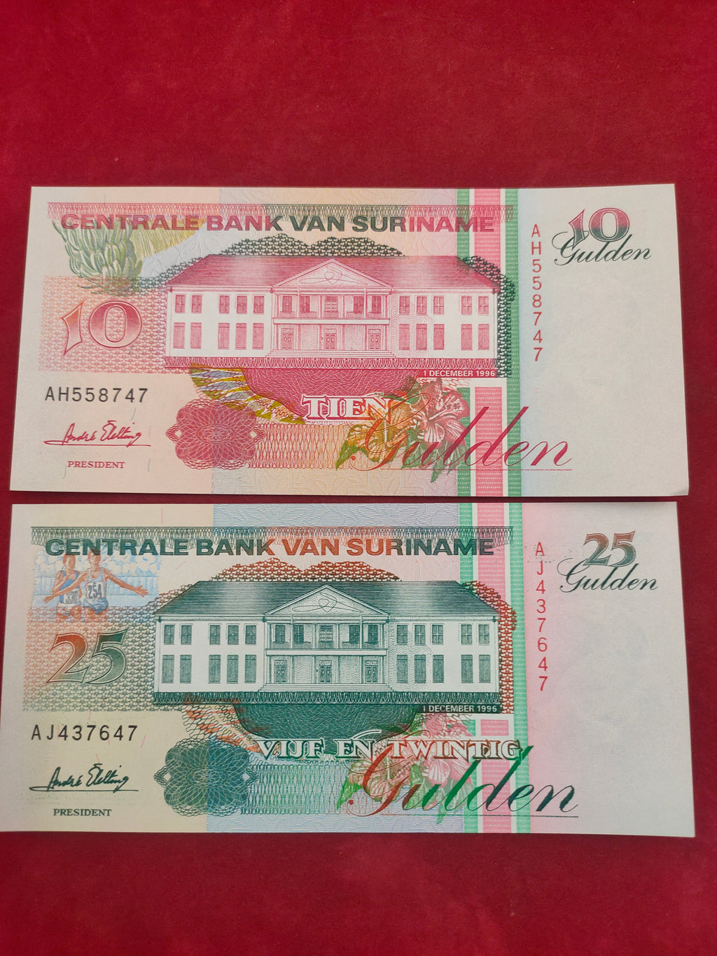 CENTRAL BANK OF SURINAME 10, 25 GULDEN (C409)