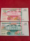 CENTRAL BANK OF SURINAME 10, 25 GULDEN (C409)