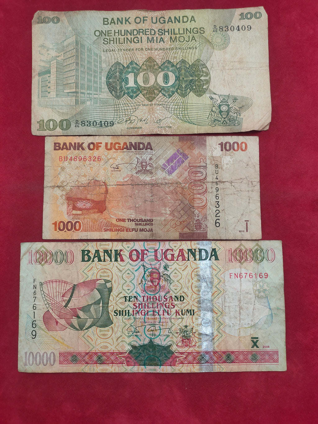 BANK OF UGANDA 100, 1000, 10000 SHILLINGS (D708)