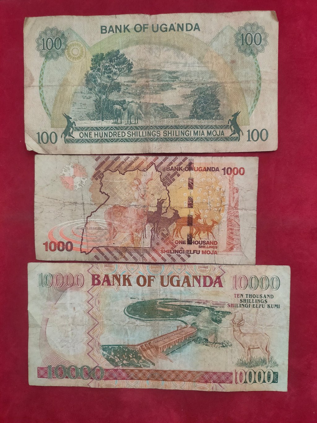BANK OF UGANDA 100, 1000, 10000 SHILLINGS (D708)